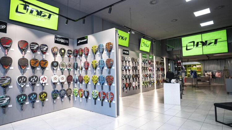 Padel store interior with functional design, visual order and neutral materials